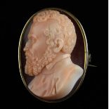 A 19th Century Italian Agate Cameo carved with a bust of a bearded gentleman in a gilt mount.