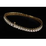 A 9ct Gold & Diamond Bracelet composed of box-from links set with a 2 ct total of diamonds,