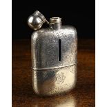 A Large Silver Clad Hip Flask engraved with scrolling foliage and engraved with initial N.