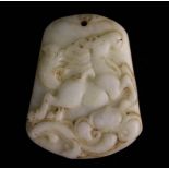 A 19th Century Chinese Jade Amulet Pendant carved in relief with a prancing horse amongst scrolling