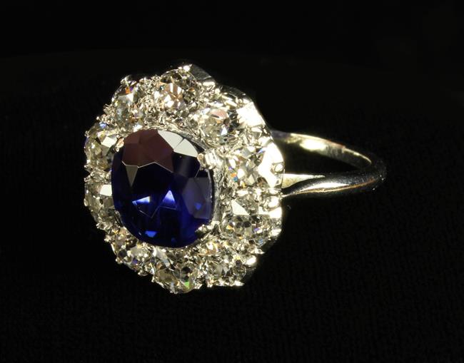 A Large and Beautiful Sapphire and Diamond Ring. The 2.