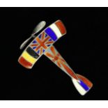 A Enameled World War I Commemorative Brooch in the form of an early monoplane,