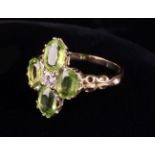 A Pretty Peridot and Diamond 9ct Gold Ring.