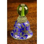 A Green Glass Mandarin Hat Finial mounted atop a white metal bell decorated with engraved reserves