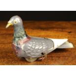 A French Vintage Painted Tin Plate Wind-up Toy Pigeon with maker's label to it's breast; V.B.