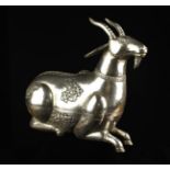 A Delightful Oriental Silver Box modelled in the form of a reclining goat wearing an ornamental