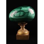 A Malachite Egg 3" (9 cm) in length,