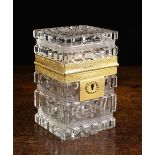 A Square Cut-Crystal Box with intricately stamped gilt metal mounts, 4¾" (12 cm) high, 3" (7.