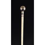 A Fine Antique Whalebone Swagger Stick with baleen inlay and a richly patinated pommel handle,