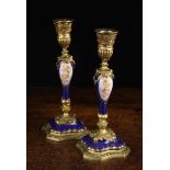 A Pair of 19th Century Sèvres Style Porcelain & Gilt Bronze Candlesticks.