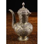 An Antique Eastern White Metal Ewer of Handleless Form.
