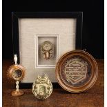 Four 19th Century Reliquaries: An unusual turned boxwood and bone monstrance encasing a tiny
