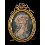 A Miniature Portrait of Adélaïde of France signed Maury and set in an oval beaded gilt metal strut