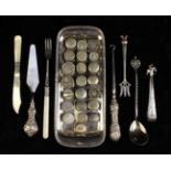 A Collection of Decoratively Engraved Silver Metal Stud Buttons on a silver plated pen tray,