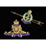 Two Military Brooches in Gold.