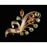 A 9ct Gold, Peridot & Citrine Plume Brooch hallmarked Birmingham 1987 [10.