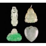 Four Small Carved Jadeite Amulets.