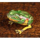 A Small Vintage German Tin Plate Wind-up Hopping Frog with glass bead eyes, 1¾" (4.5 cm) in length.