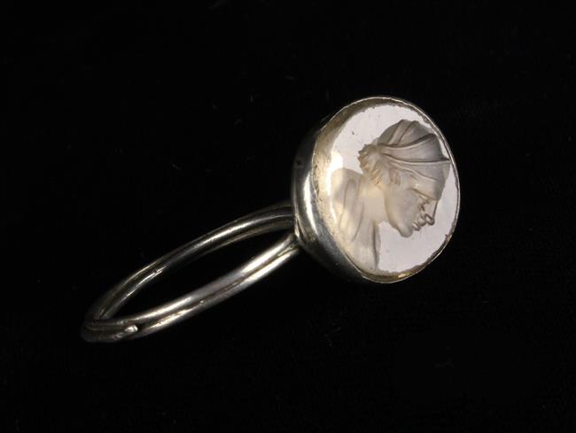 An 18th Century Silver Metal Ring in the form of a hunting horn with a crystal intaglio inset to