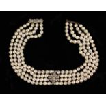 A Beautiful Pearl and Diamond Four Strand Choker/Necklace. The 6.