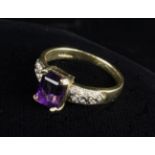 A Baguette Cut Amethyst and Diamond, 9 ct Gold ring.
