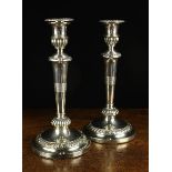 A Pair of George III Silver Candlesticks with Sheffield assay marks for 1809 and John Roberts & Co