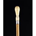 A 19th Century Malacca Walking Cane with turned ivory knop handle and a white metal ferrule