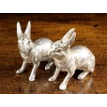 A Pair of Unusual Silver Plated Cruets: A salt and pepper shaker modelled as hares, 3½" (9 cm) high,