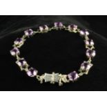 A Decorative Amethyst and 9 ct White Gold Bracelet.