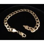 An Italian 9ct Gold Curb Chain Bracelet, 8¾" (22 cm) in length. [16.
