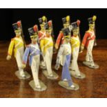 A Set of Eight Large Vintage Painted Lead Toy Soldiers marching, 5 (14 cm) in height.