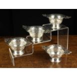 Four Pretty Pierced Silver Dishes: Three with assay marks for Birmingham 1904 and Deakin & Francis