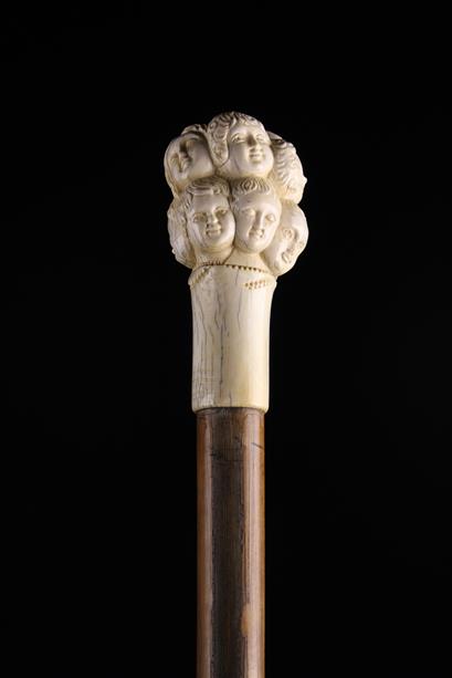 An Antique Walking Stick with a carved bone handle in the form of a cluster of twelve children's - Image 2 of 2