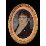 A Late 18th/Early 19th Century Oval Miniature Portrait of a Young Gentleman of fashion wearing a
