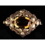 A Pretty Victorian Citrine and Yellow Gold Brooch. The large central citrine stone, approx. 21 x 14.