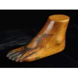 An Antique Carved Treen Folk Art Snuff Box carved in the form of a foot with a hinged lid to the