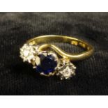 An Impressive Sapphire and Diamond Twist 18ct Gold Ladies Ring. The central, approx. 0.