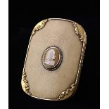 A 19th Century Gold Mounted Shark-skin Clad Case of curved, rounded oblong form.