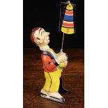 A Vintage D.R.G.M. German Tin Plate Wind-up Toy Man holding spinning parasol, 8" (20 cm) in height.