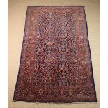 A Persian Carpet, possibly Kerman-Laver, woven in rose pink,