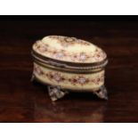 A Small 19th Century Parisian Porcelain Jewel Casket by Tahan of oval form.