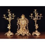 A Fine 19th Century French Ormolu Clock Garniture Set in the Louis XV Style.