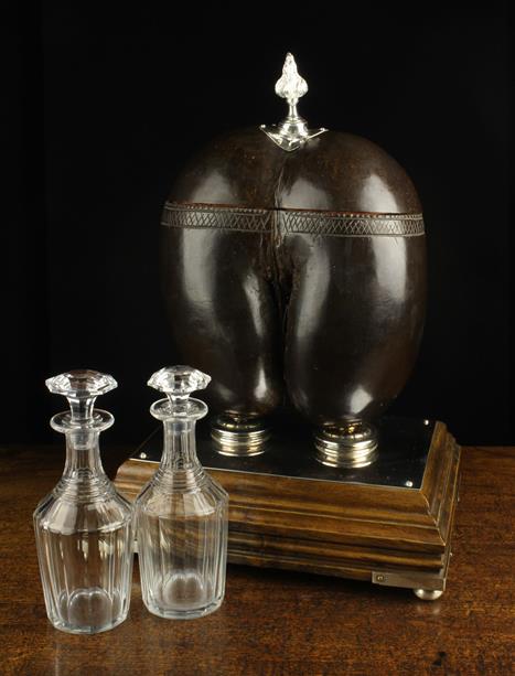 A Coco de Mer converted to a twin chamber decanter holder.