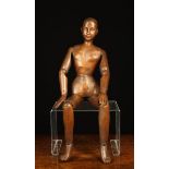 A 19th Century Carved Wooden Artist's Lay Figure with articulated limbs,
