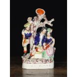 A Staffordshire Flat Back Figural Spill Vase entitled "The Rival", 30.5 cm in height (12"). .