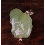 A Jade Pebble Carving of a Chinese Deity mounted with a 9 carat gold pendant loop, 1½" (3.
