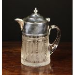 A Hand Engraved Glass Jug with silver plated mounts.