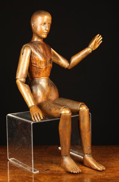 A 19th Century Carved Wooden Artist's Lay Figure with articulated limbs,
