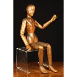 A 19th Century Carved Wooden Artist's Lay Figure with articulated limbs,