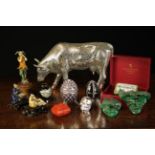 A Group of Ornamental Miscellaneous: A crazed silver coloured study of a cow, 7" (18 cm) high,